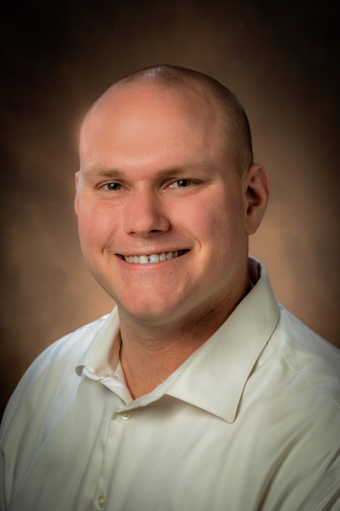 headshot of zac grisham